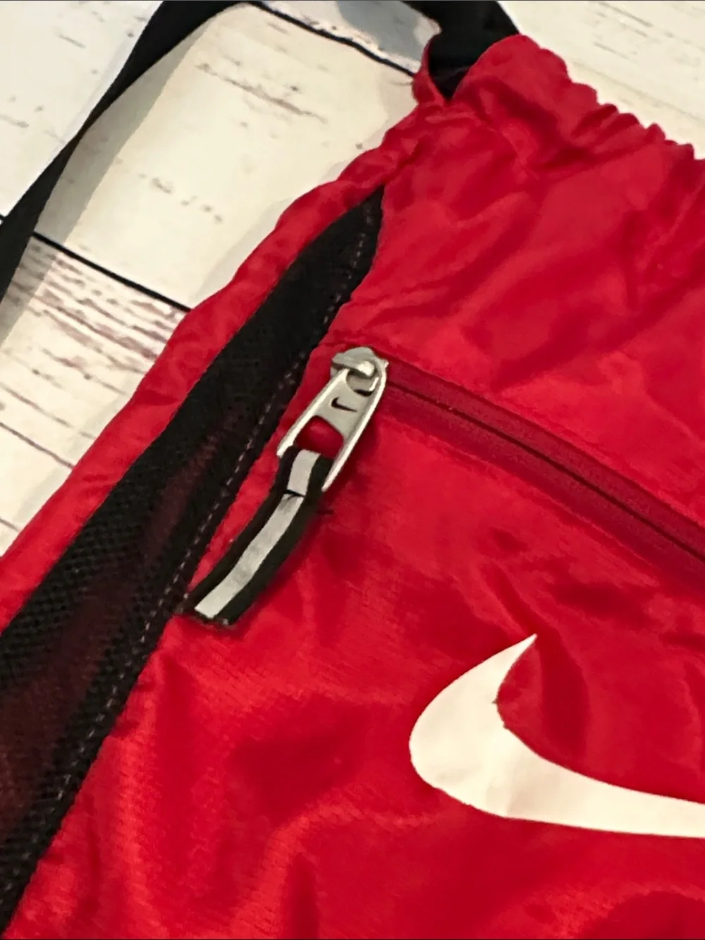 Nike Red and Black Drawstring Backpack with White Swoosh